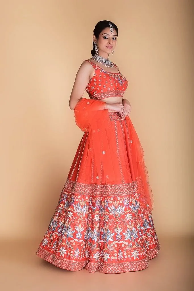 Bright Orange Embroidered Lehenga set.